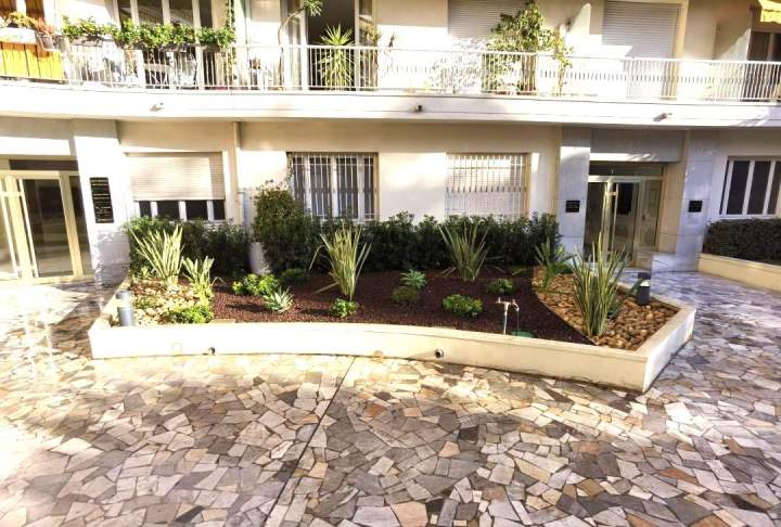 entrée copropriété espace verts soignés